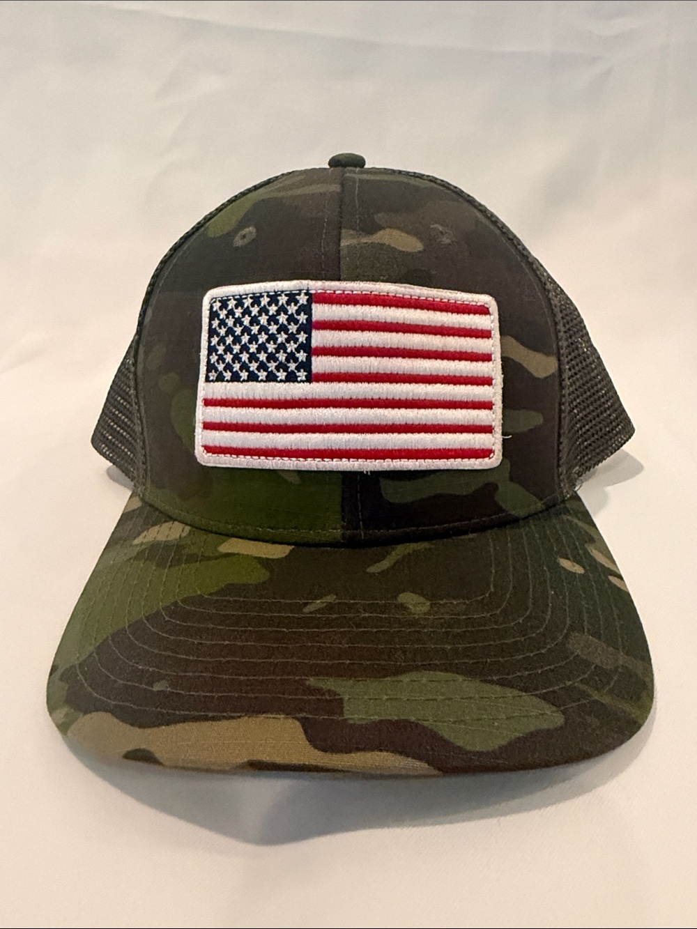 Camo Men’s Trucker Hat with American Flag Patch
